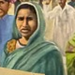 A woman in a green shawl